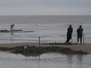 [Fishing at low tide]