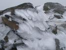 [Ice on the summit cairn]
