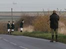 [Hunters at the side of the road]