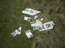 [Sign fragments]
