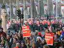 [The dawn procession snaking across Parliament Square]